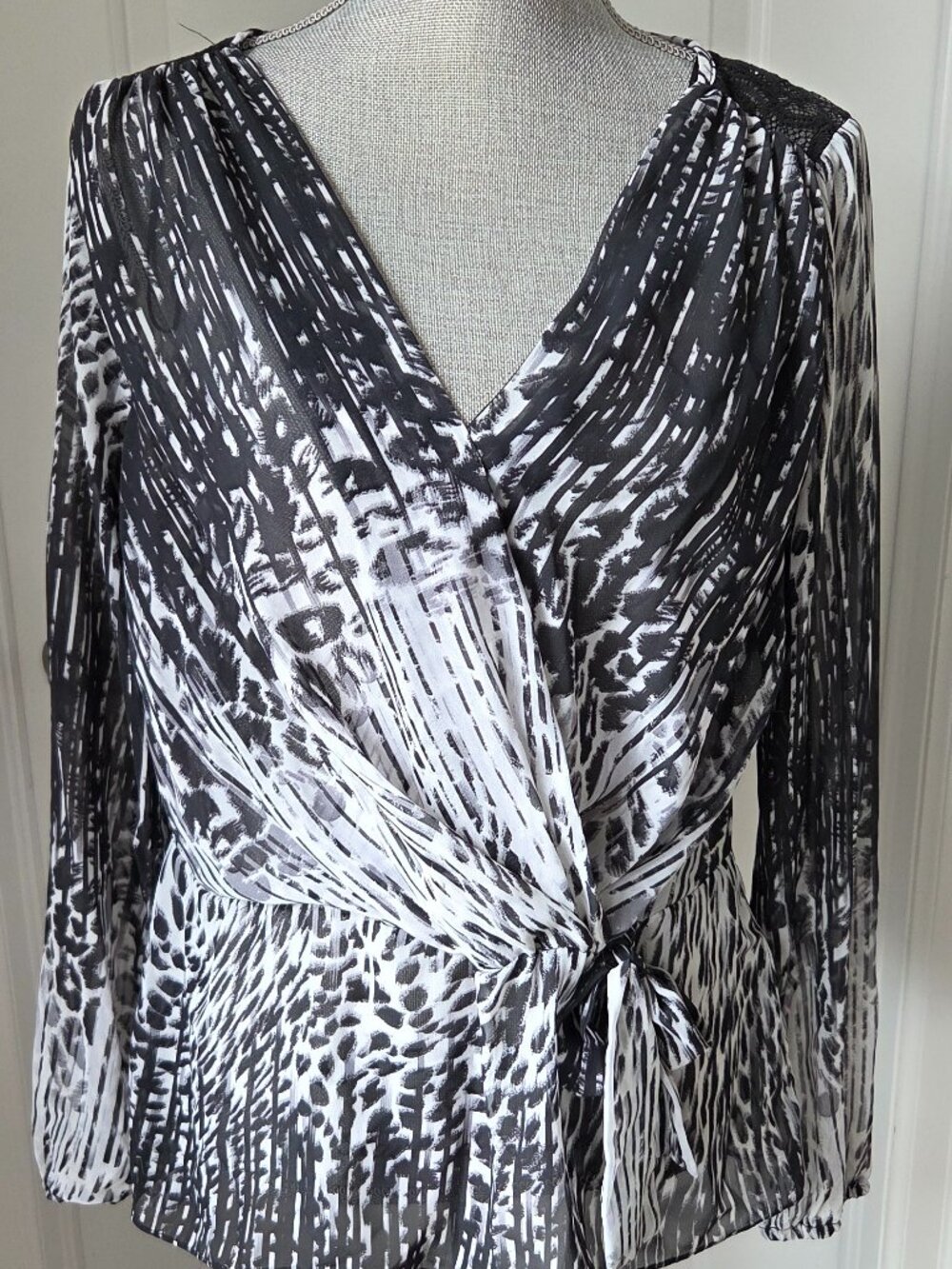 Lipsy London abstract animal print long sleeve faux wrap blouse size 12 NWT
